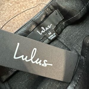 Vegan leather black mini skirt with slit